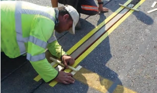 Intercomp sensors are embedded in 3" (75 mm) channels cut into the pavement.